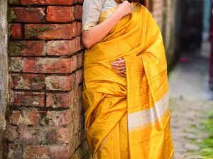 Buy Latest Raw Silk Yellow Saree with Blouse from Mirraw