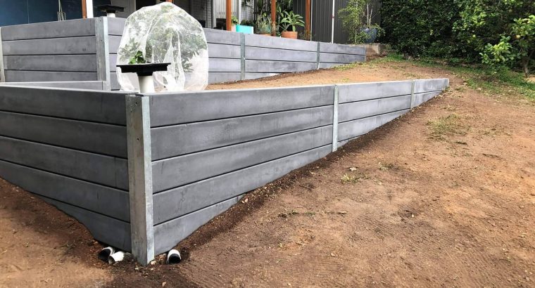 Double tier concrete sleeper retaining wall