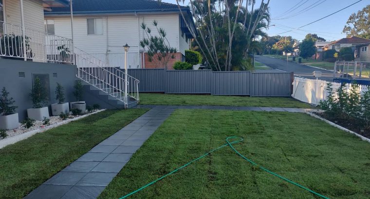 Colour bond fencing with double swinging gates and fresh new lawn