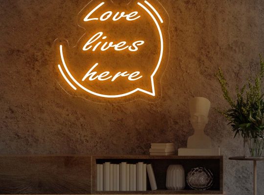 Love Lives Here Neon Sign – Illuminate Your Space with Warmth and Affection