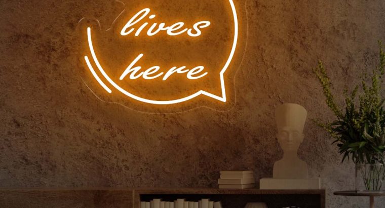 Love Lives Here Neon Sign – Illuminate Your Space with Warmth and Affection